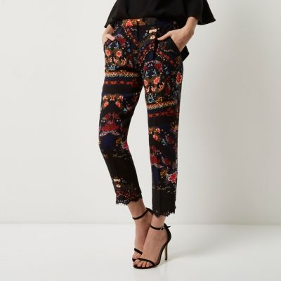 Black lace hem floral print trousers